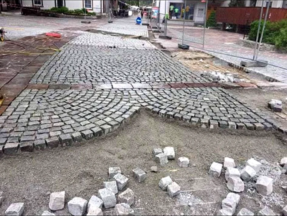 Decorative cobblestone paving with fan pattern